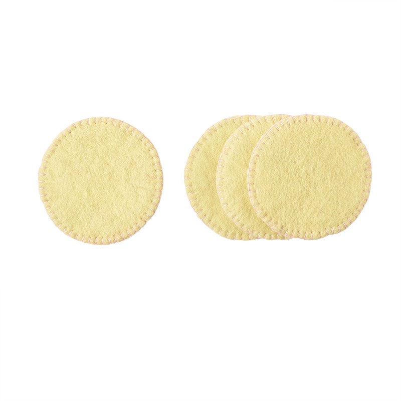 Lot de 4 sous-verres en feutre de la marque Aveva, coloris jaune.